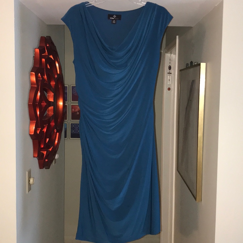 Beautifully draped Ronni Nicole dark turquoise